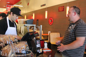 Owner of the Jimmy John’s located off of FM 544, Matt Morton, helps with daily operations by taking a customers order behind the cash register. Morton enjoys working with his employees to better understand what they deal with and how to make his business more efficient.