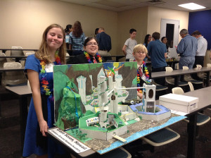 Participants in the 'Future City' science fair competition share their idea of the ideal future city. Pictured, from left, are Paige Smith, Sammy Flanagan and Evan Smith.