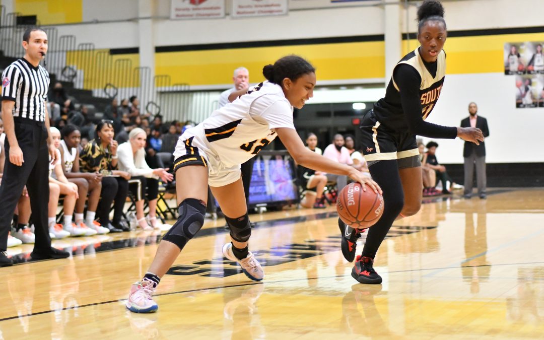 Lady Panthers win first district game