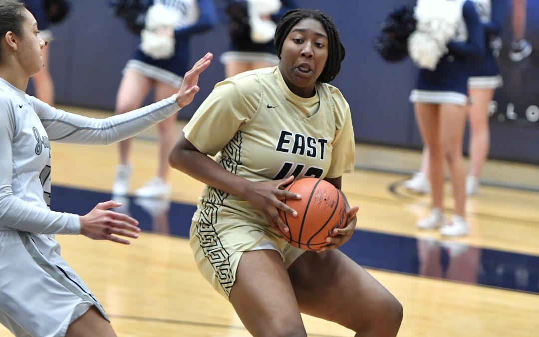 Plano East splits basketball games against Plano